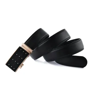 Detail of men's black leather belt featuring a gold automatic buckle and fine stitching