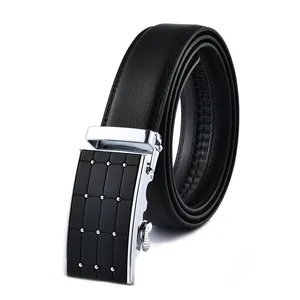 Close-up of men's cowhide leather belt with silver automatic buckle and lychee texture