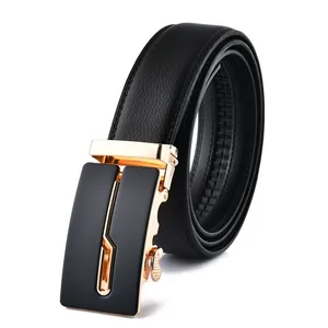 Detail view of premium leather belt with black gold ratchet buckle and lychee texture