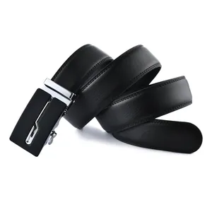 Close-up of black lychee grain leather belt with silver automatic buckle and double stitching