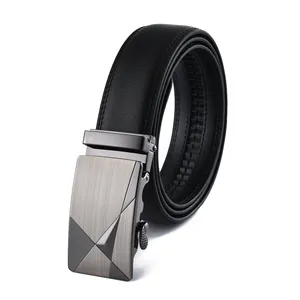 Close-up of brushed metal automatic buckle with X-pattern and black lychee leather belt