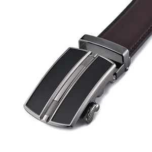 Close-up of brown leather belt with brushed metal automatic buckle and fine stitching