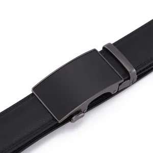 Detail of black leather business belt featuring a gunmetal textured automatic buckle