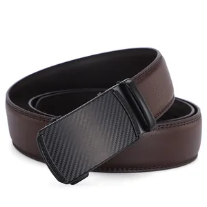 Detail of men's leather belt buckle with carbon fiber texture and Greek key pattern