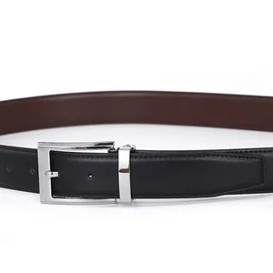 Men's double-sided leather belt with classic silver pin buckle on white background