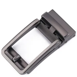 Detail of gunmetal grey zinc alloy automatic belt buckle with brushed matte finish