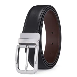 Close-up of double-sided leather belt with silver pin buckle and contrast stitching