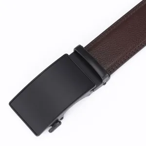 Detail of dark brown leather belt with matte black automatic buckle and double stitching