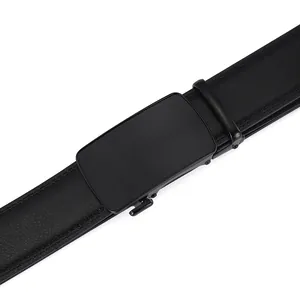 Close-up of black leather belt with matte metal automatic buckle and textured strap