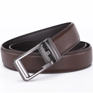 Detail of dark brown leather belt with lychee texture and gun-metal automatic buckle