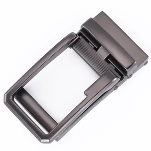 Macro detail of the gunmetal grey alloy automatic slide buckle for men's leather belts