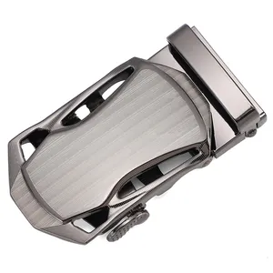 Detail of automatic belt buckle in dark gunmetal with brushed metal finish