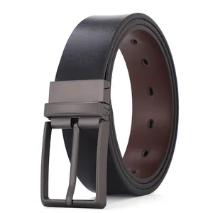 Close-up of men's reversible leather belt with gunmetal buckle and black/brown strap