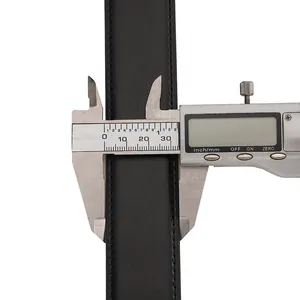 Macro shot of measuring 35mm width of black leather belt with digital caliper tool