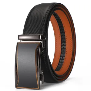 Detail of men's belt with carbon fiber texture, brown inner leather and automatic buckle