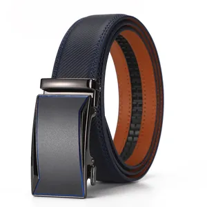 Detail of blue leather belt showing gunmetal automatic buckle and carbon fiber texture