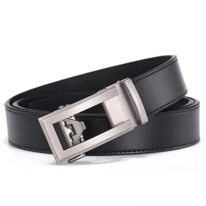 Detailed macro view of black leather belt with brushed metal automatic buckle and stitching