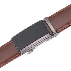 Detailed close-up of dark brown leather belt featuring gunmetal alloy automatic buckle