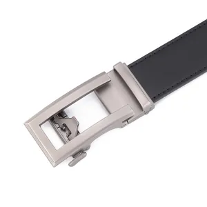 Detail of premium black leather belt with a modern gunmetal brushed automatic buckle