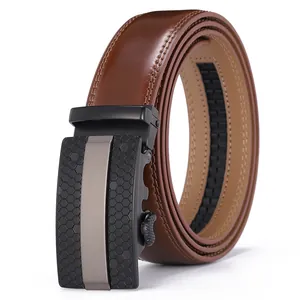 Detail of brown leather belt showing automatic ratchet buckle with honeycomb texture