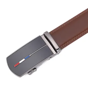 Close-up of brown leather belt with double stitching and grey alloy automatic buckle