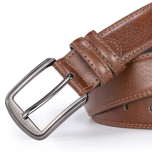 Close-up of dark brown leather belt with gunmetal pin buckle and double-stitched edges