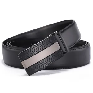 Detail of men's leather belt featuring a black honeycomb buckle with silver brushed metal strip