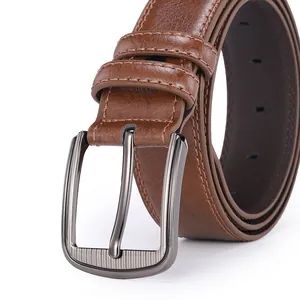 Detail of dark brown leather belt with gunmetal pin buckle and double-stitch edges