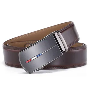 Macro detail of men's brown leather belt with matte metal automatic buckle and stripe