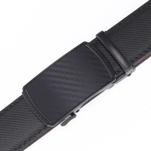 Detail of men's leather belt with carbon fiber texture buckle and Greek key pattern