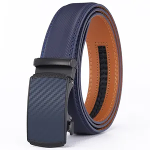 Detail of blue leather belt with matte black carbon fiber texture automatic buckle