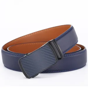 Detail of navy blue textured leather belt with black automatic buckle and carbon fiber inlay