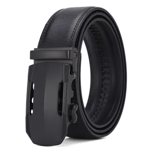 Close-up of black leather belt with matte industrial automatic buckle and lychee texture