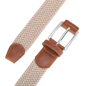 Beige elastic woven belt with brown leather trim and silver metal pin buckle