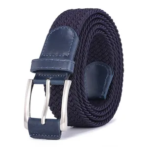 Detailed view of dark blue braided elastic belt with silver metal buckle and leather trim