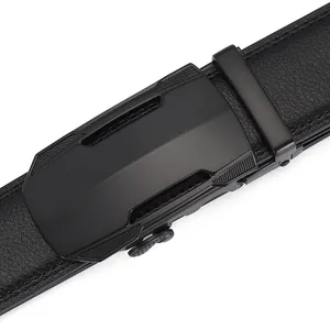 Close-up of black leather belt with matte metal automatic buckle and textured grain
