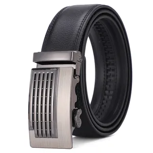Detail of black leather belt with brushed metal automatic buckle and textured grain