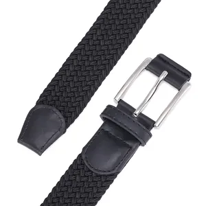 Detail of black elastic woven belt with metal pin buckle and premium leather ends
