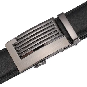 Detail view of men's leather belt with brushed gunmetal automatic buckle and lychee texture