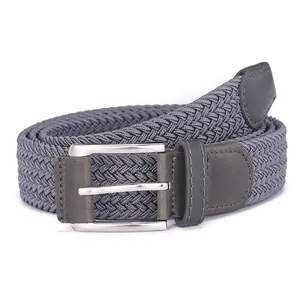 Detail of dark grey woven stretch belt featuring silver pin buckle and leather trims
