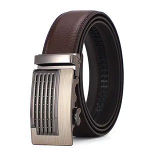 Detail of men's leather belt showing dark brown litchi texture and gunmetal buckle