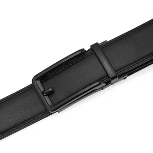 Close-up of black leather belt with lychee texture and matte black pin buckle