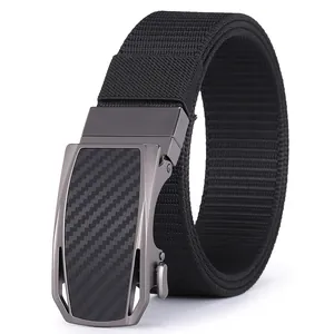 Detail of nylon woven belt with dark grey metal automatic buckle and carbon fiber inlay