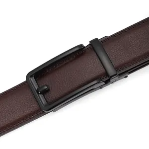Close-up of brown litchi pattern leather belt with a matte black metal buckle