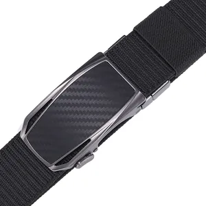 Close-up of men's nylon belt with automatic alloy buckle and carbon fiber texture