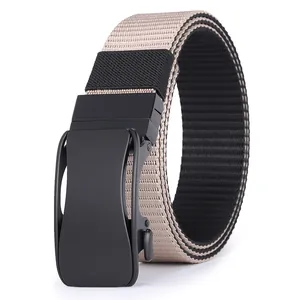 Detail of dual-sided nylon tactical belt with matte black automatic metal buckle