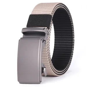 Close-up of khaki nylon canvas belt with a matte gun-grey automatic buckle and dual-tone strap