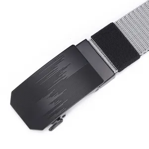 Detail of grey nylon belt with black matte metal automatic buckle and textured design