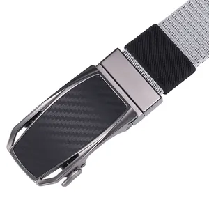 Close-up of gunmetal alloy automatic buckle with carbon fiber texture and gray woven belt