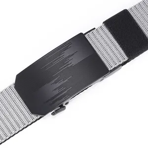 Macro shot of matte black metal buckle with tactical grey nylon webbed belt strap